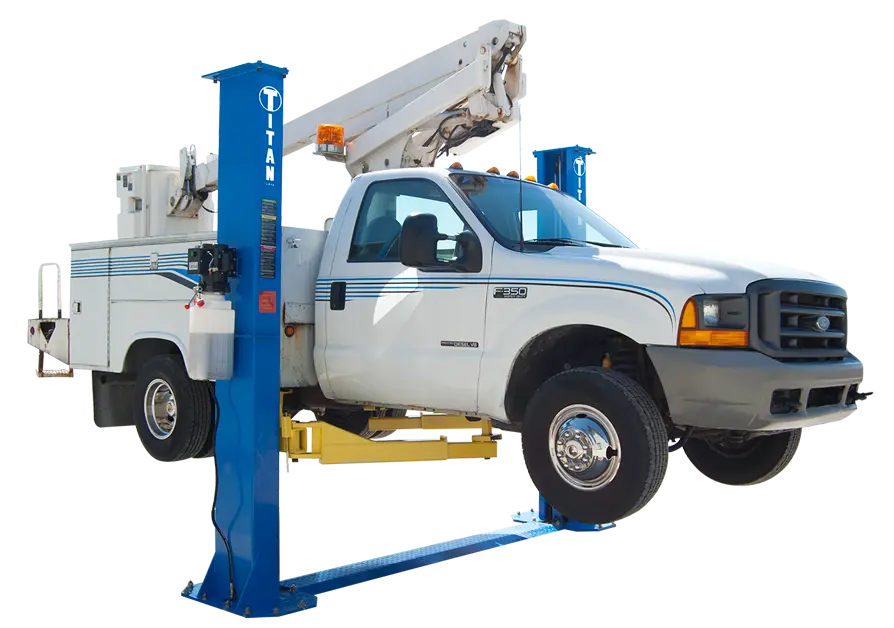 white electric truck with bucked on lift